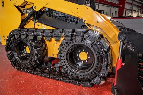 chains for tracks skid steer|skid loader tracks over tires.